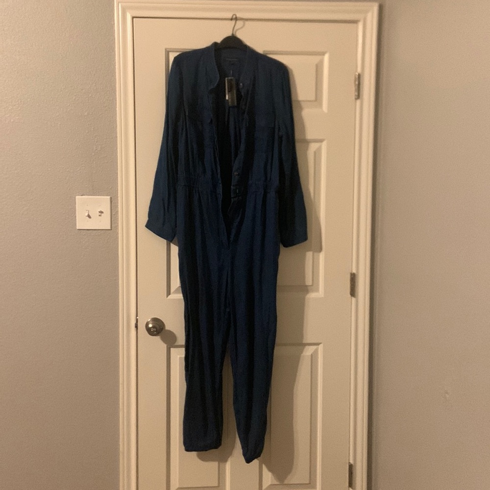 Banana Republic Blue denim jumpsuit. soft material. Size 14 Never worn Slim fit.